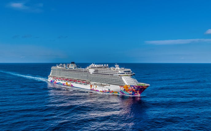 Cruise ship sailing on open sea, World Dream Getaway Cruise.