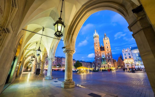 Krakow's St. Mary's Basilica viewed from Cloth Hall arcade during a bike tour.