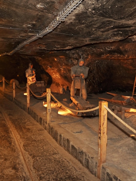 Miners' sculptures in Wieliczka Salt Mine tunnel, Krakow.