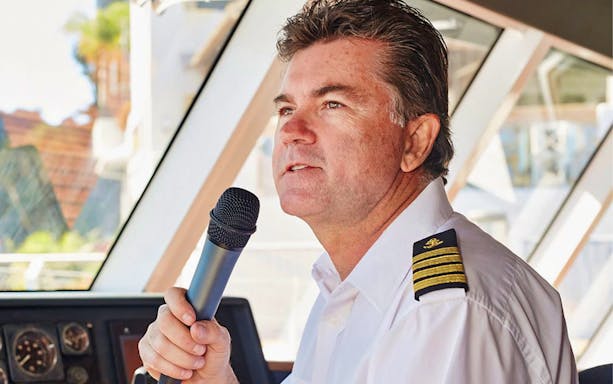 Captain speaking on Sea World sightseeing cruise.
