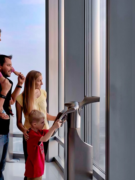Visitors enjoying the view from Burj Khalifa's At The Top, Levels 124 and 125, Dubai.