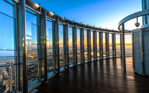 Burj Khalifa observation deck view, Dubai skyline, IMG Worlds of Adventure combo offer.