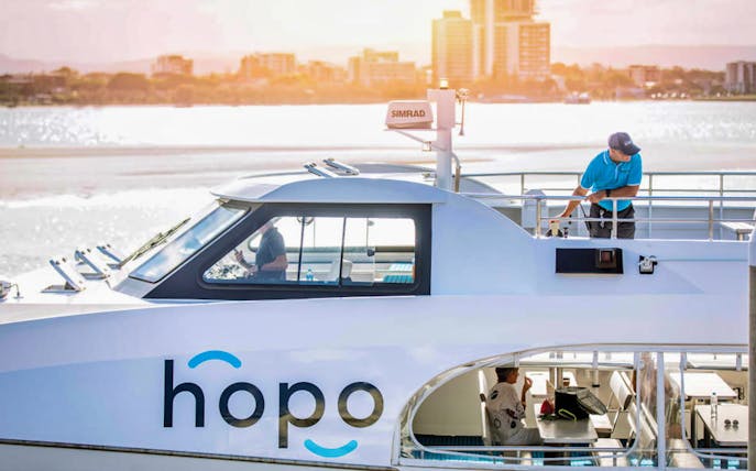 Hopo ferry on Gold Coast waters with passengers enjoying the view.