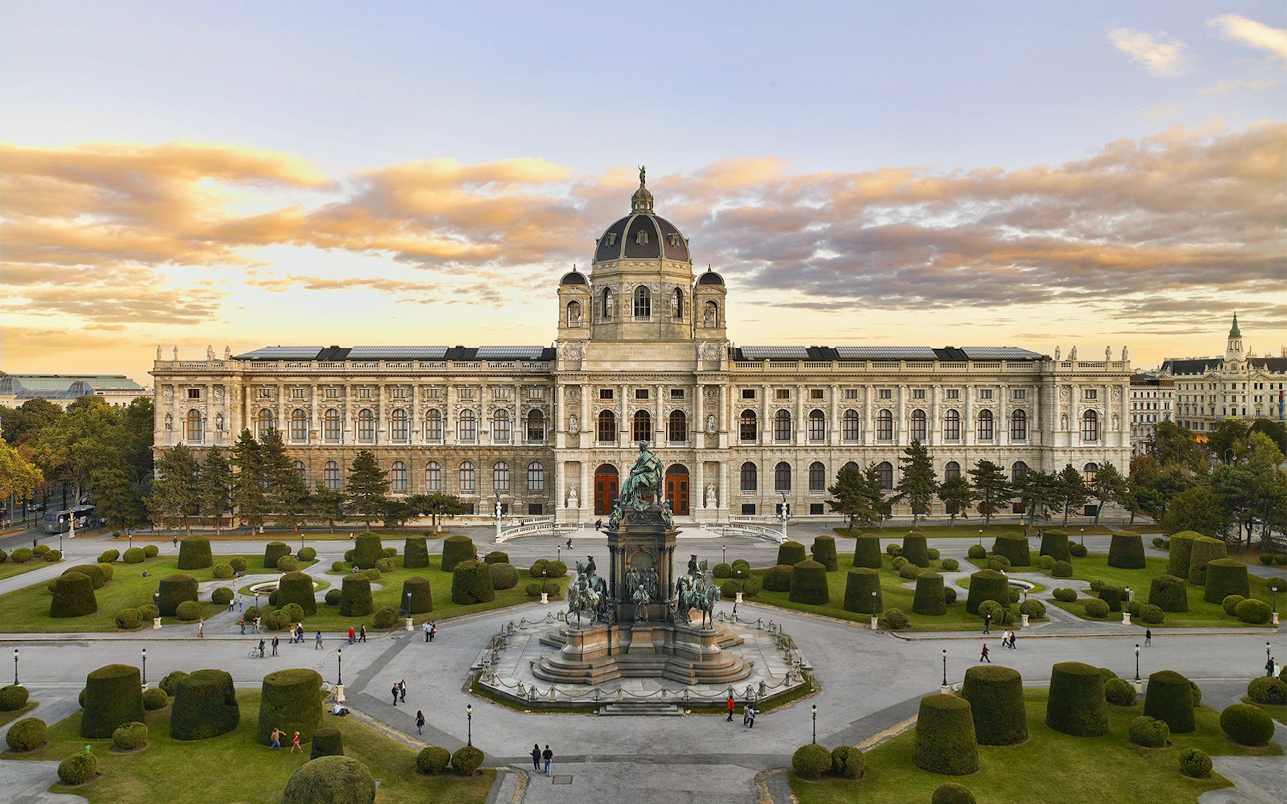 Visitors exploring the grand interiors of Kunsthistorisches Museum in Vienna, Austria