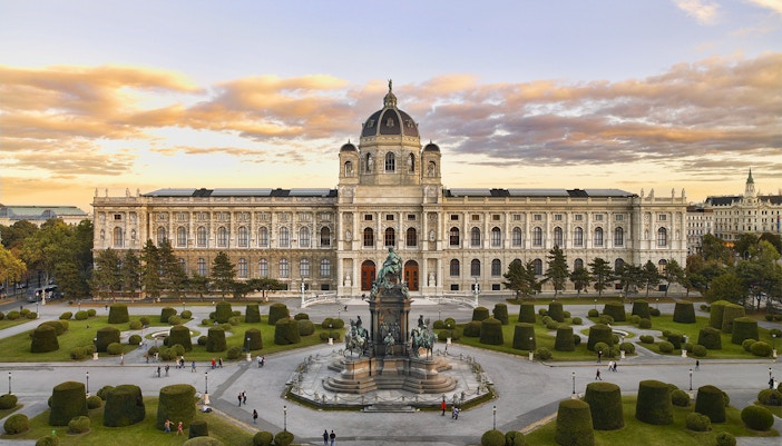 Visitors exploring the grand interiors of Kunsthistorisches Museum in Vienna, Austria, one of the attractions included in the Combo: Leopold Museum + Kunsthistorisches Museum Tickets
