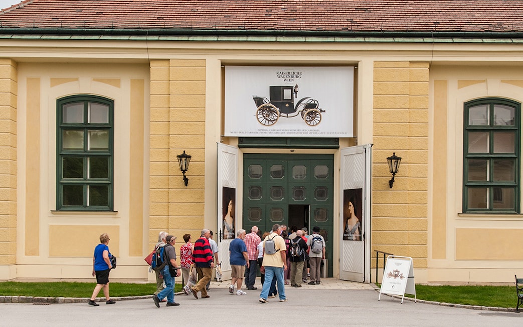 Visitors entering the Imperial Carriage Museum in Vienna.