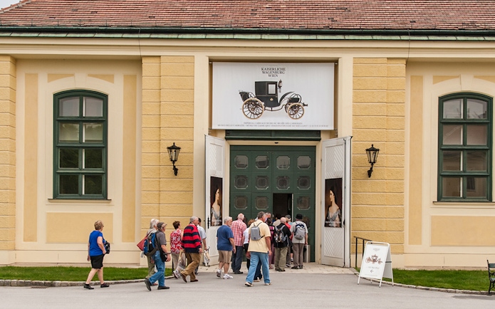 Visitors entering the Imperial Carriage Museum in Vienna.