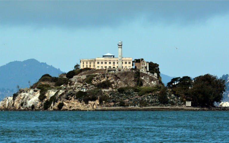 Alcatraz Island with historic prison building in San Francisco Bay.