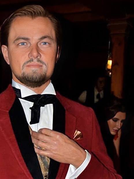 Wax figure of Leonardo DiCaprio in a red suit at the wax museum in Madrid.