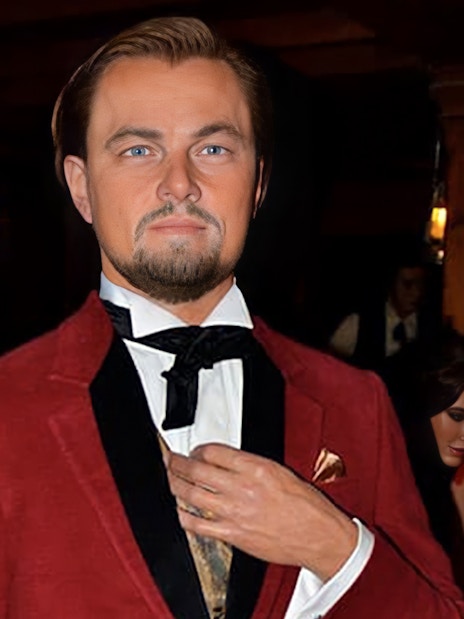 Wax figure of Leonardo DiCaprio in a red suit at the wax museum in Madrid.
