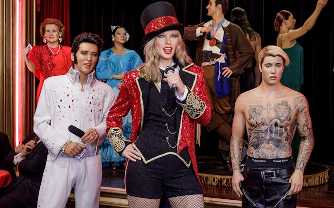 Wax figures of celebrities at Wax Museum Madrid exhibit.