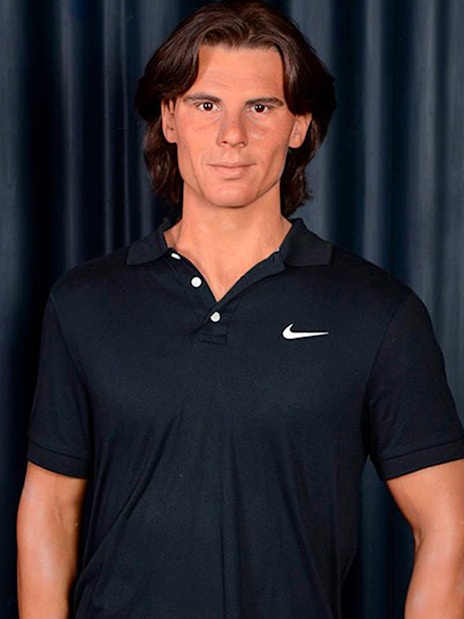 Wax figure of a man in a black shirt at Wax Museum Madrid.