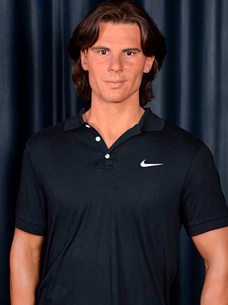 Wax figure of a man in a black shirt at Wax Museum Madrid.