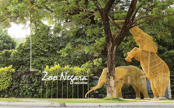 Zoo Negara entrance with elephant sculptures, Malaysia.