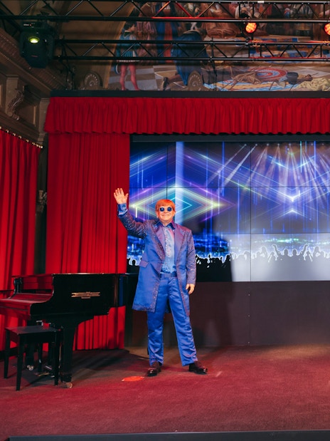 Wax figures of musicians on stage at Wax Museum Barcelona.