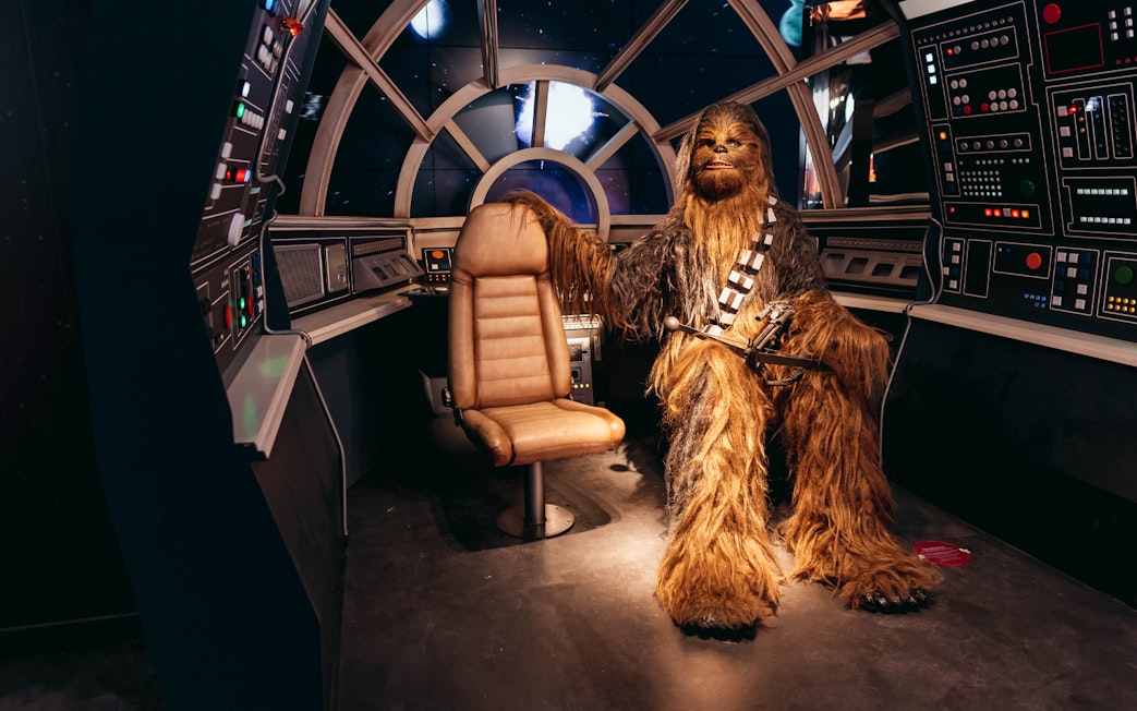 Chewbacca figure in spaceship cockpit at Wax Museum Barcelona.