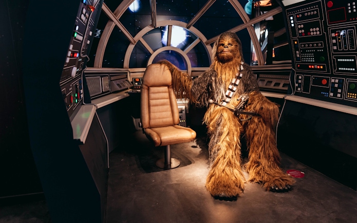 Chewbacca figure in spaceship cockpit at Wax Museum Barcelona.