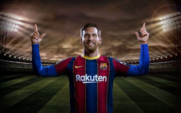 Wax figure of a soccer player in Barcelona jersey at Wax Museum Barcelona.