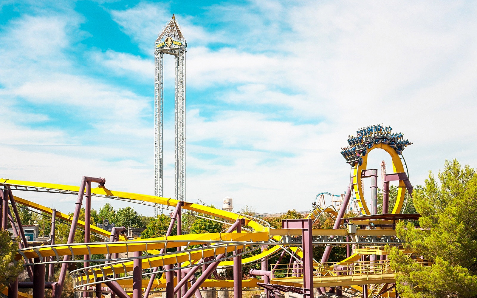 Visitors enjoying water slides at Parque Warner Beach, Madrid, Spain.