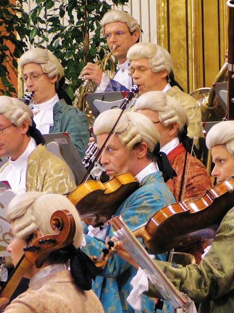 Orchestra in period costumes performing at Wiener Musikverein.