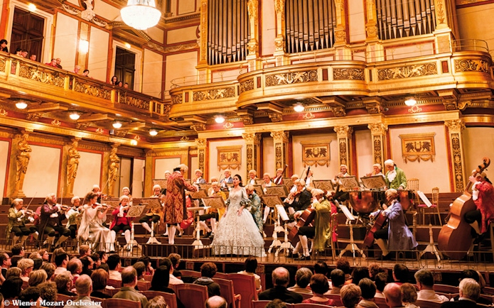 Orchestra performing at Wiener Musikverein concert hall in Vienna.