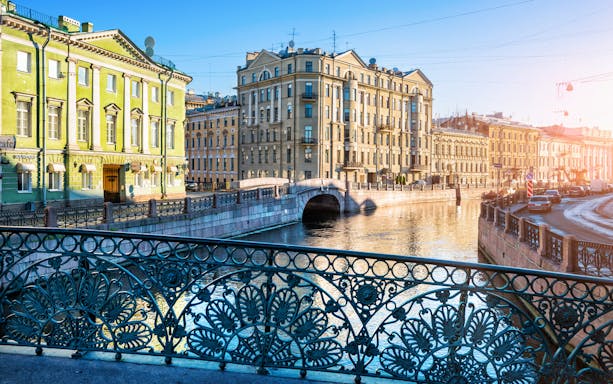 Canal view with historic buildings in St. Petersburg, Russia, part of a full-day city tour.