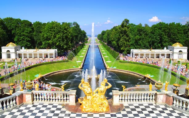 Fountains and gardens at the Great Peterhof Palace, Russia, during a guided bus tour.
