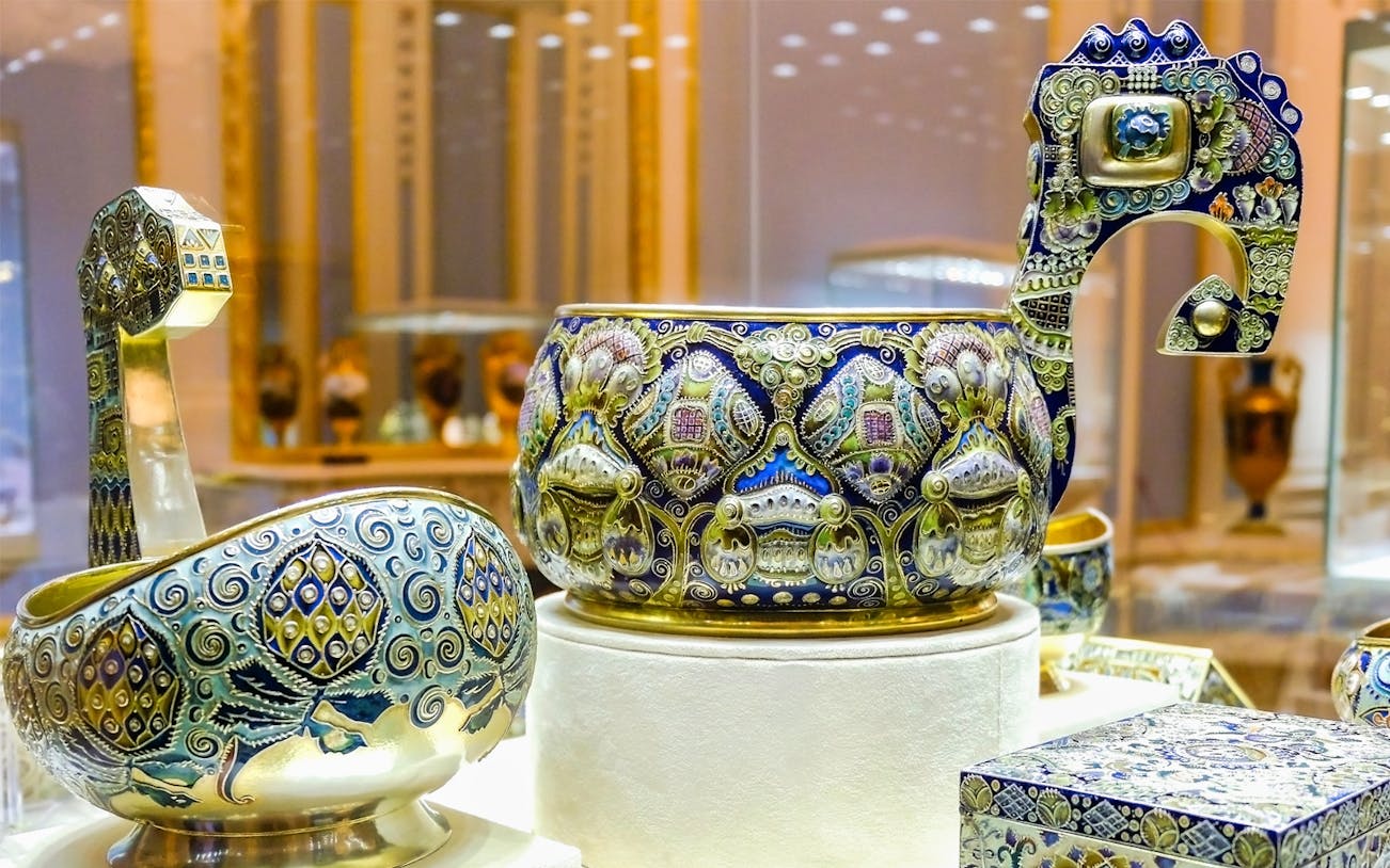 Fabergé Museum ornate enamel bowls and box on display.
