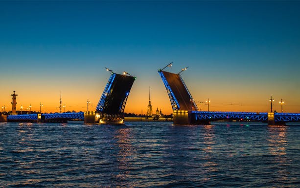 Open drawbridge over the Neva River at sunset, St. Petersburg, Russia.
