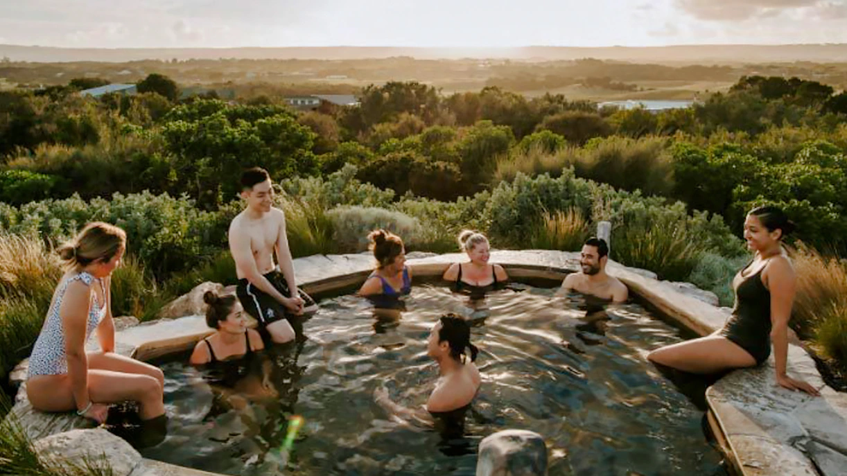 Visitors enjoying thermal pools at Mornington Peninsula Hot Springs Bath House Revitalise, Melbourne.