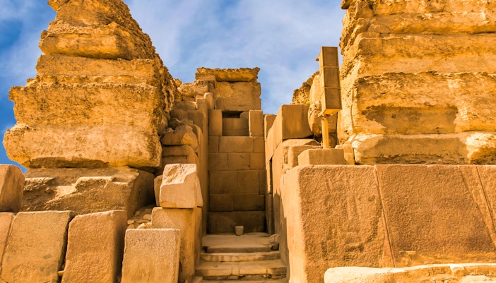 Ancient stone entrance at the Pyramids of Giza, Egypt, on a half-day tour.