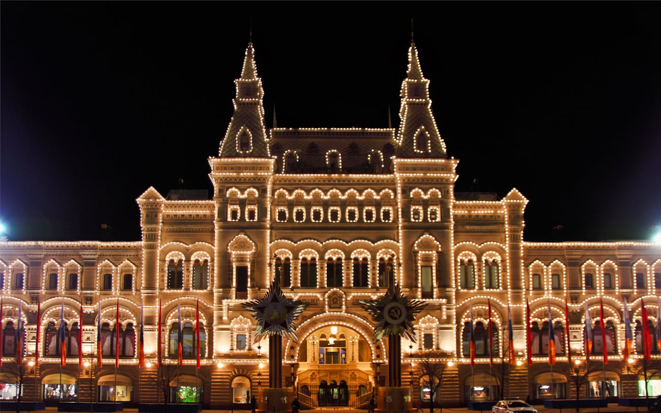 GUM department store illuminated at night, Moscow City Walking Tour.