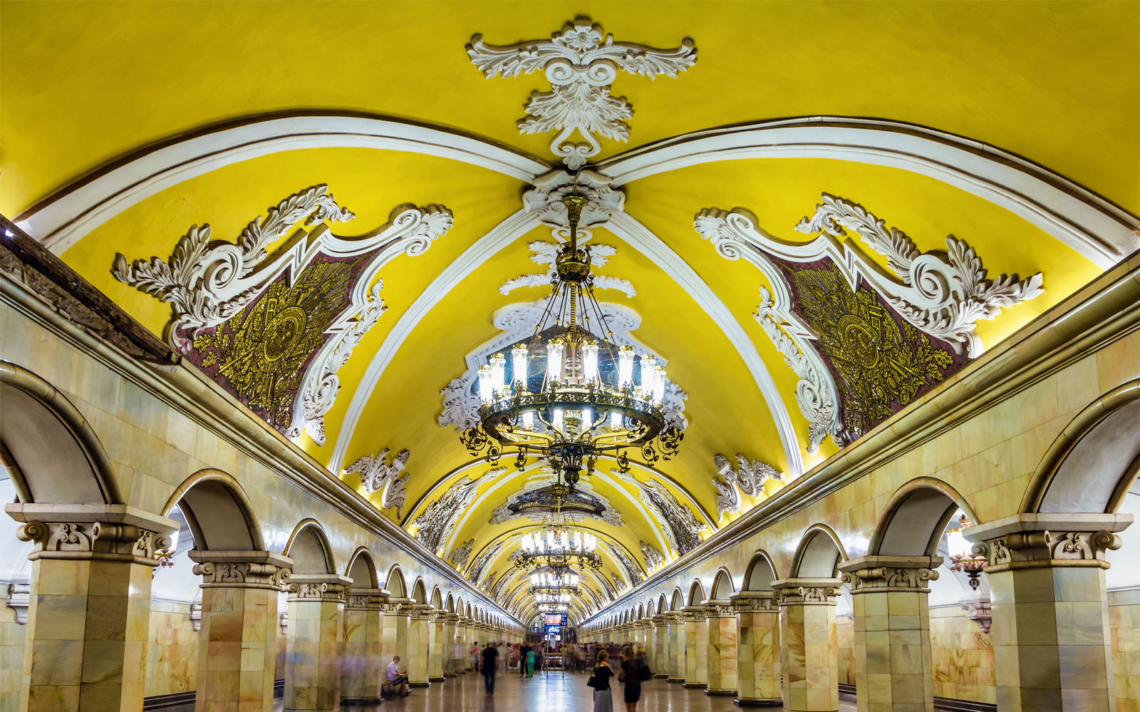 Moscow metro station with ornate chandeliers and decorative arches on the After Dark tour.