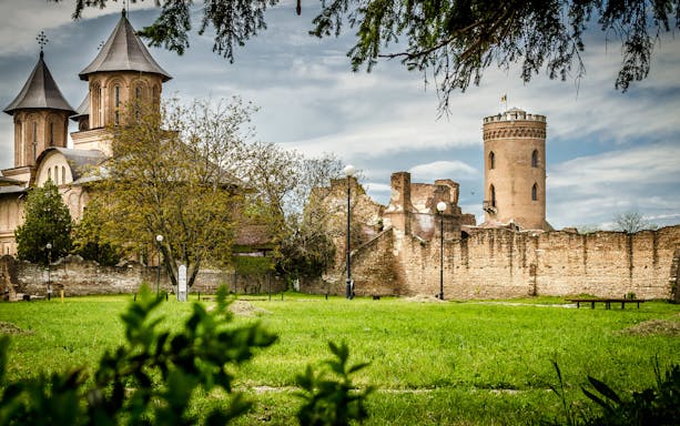 Medieval fortress and church in Târgoviște, Romania, linked to Dracula's history.