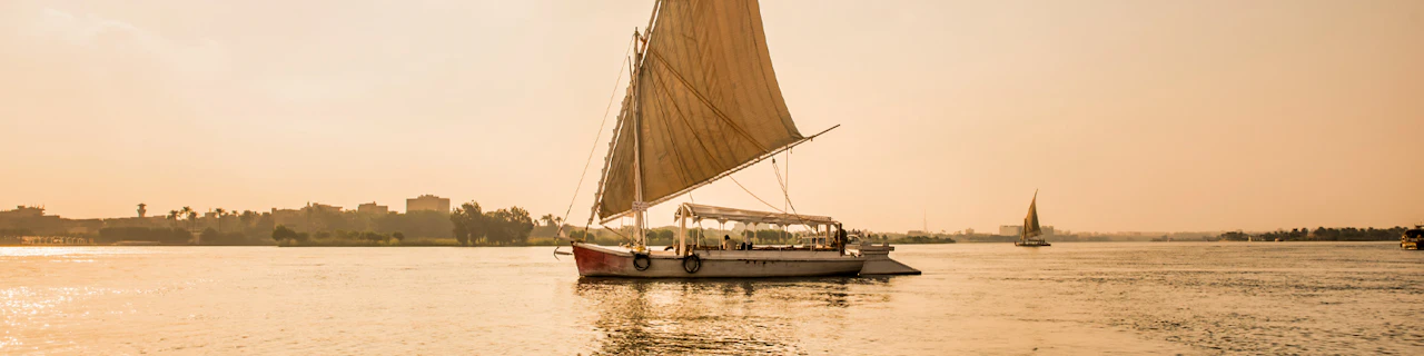 From Cairo: Half-Day Giza Pyramids & Sphinx Guided Tour with Nile Felucca Ride & Hotel Transfers