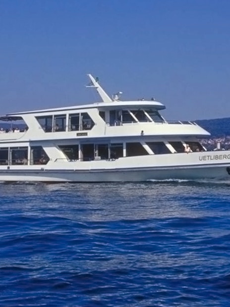 Sightseeing cruise boat on Lake Zürich during Half-Day Tour with Lindt Home Of Chocolate.