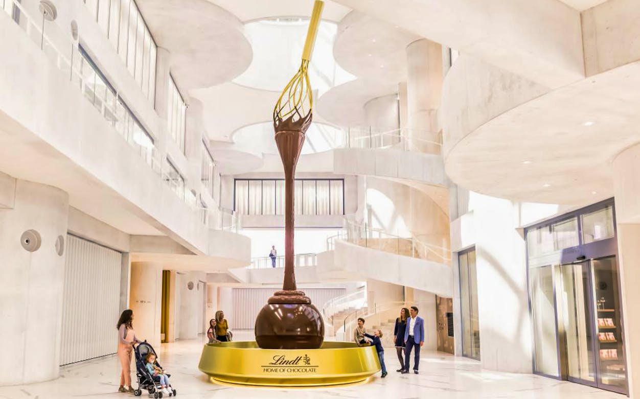 Lindt Home of Chocolate interior with large chocolate fountain, Zürich tour.