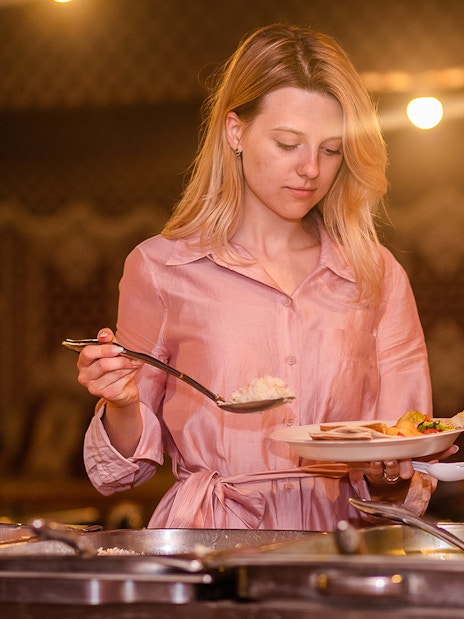 Buffet dinner during desert safari tour in Dubai.