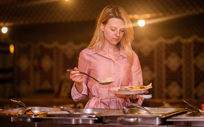 Buffet dinner during desert safari tour in Dubai.