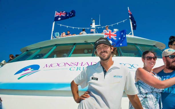 Crew member and passengers on Moonshadow Dolphin Watch Cruise in Port Stephens.