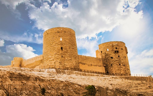Citadel of Saladin in Cairo under a blue sky.