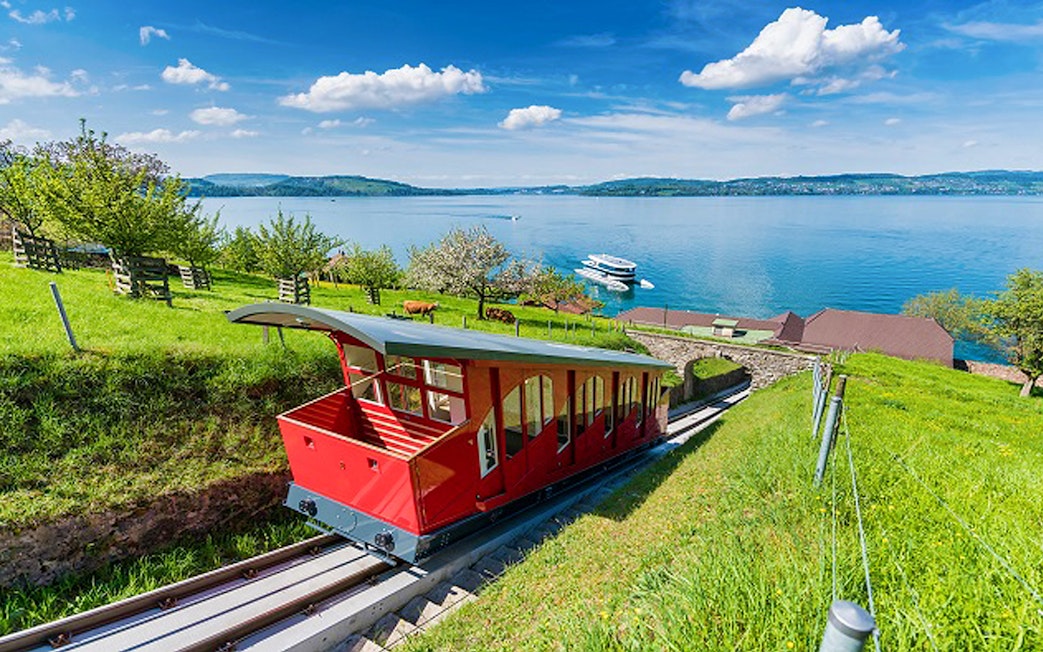 Funicular ascending Mt. Bürgenstock with Lake Lucerne view, part of Zürich day trip.