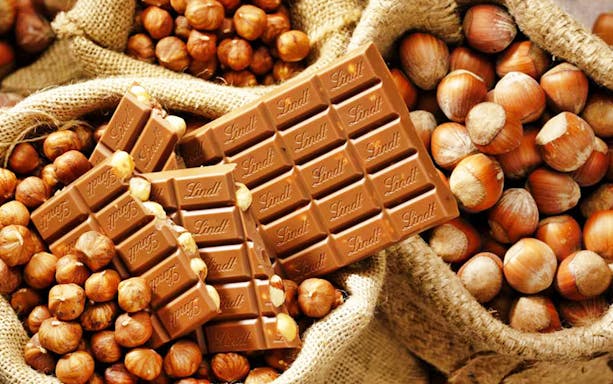 Lindt chocolate bars with hazelnuts in burlap sacks, part of Appenzell tour from Zürich.