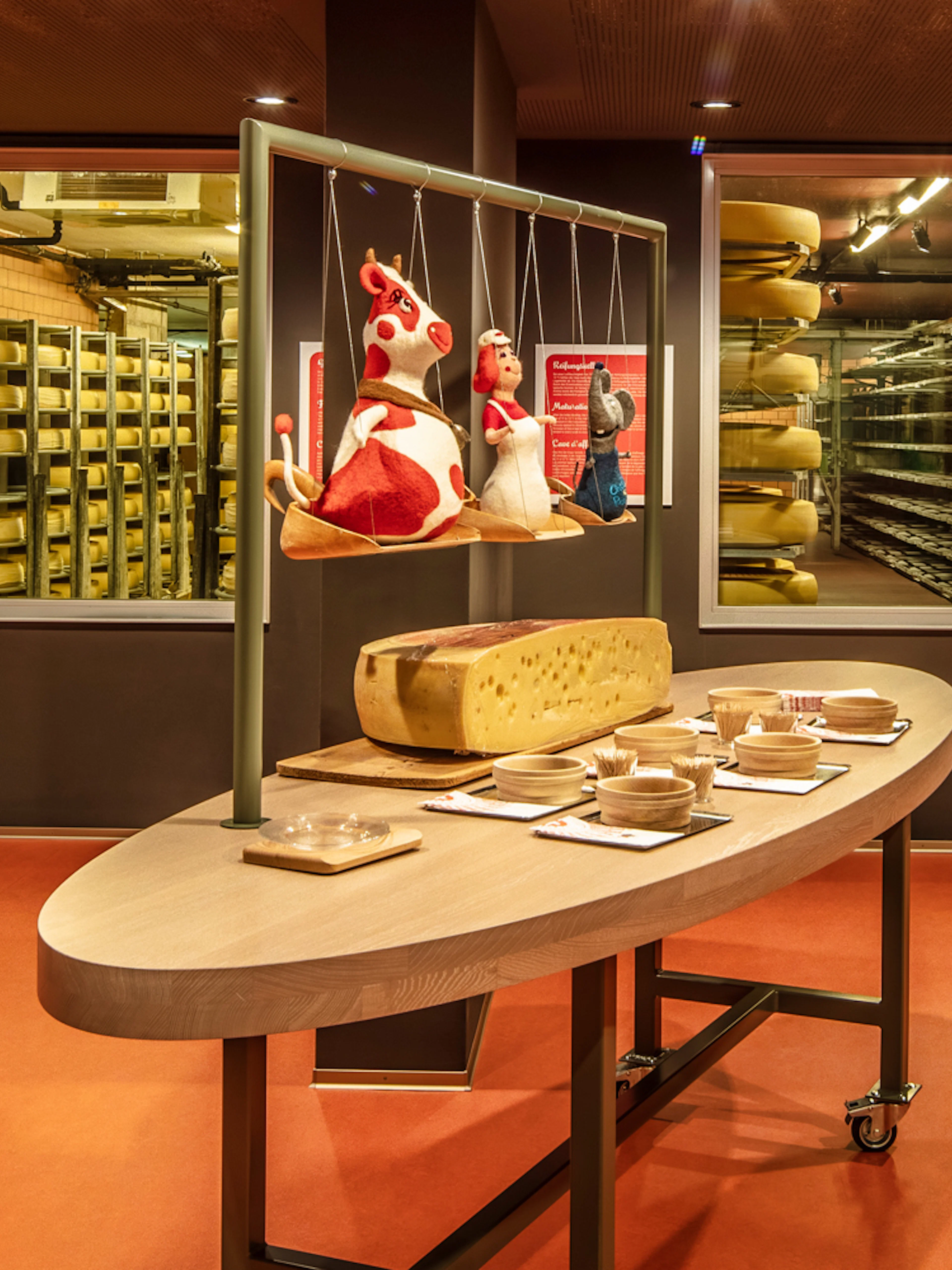 Cheese aging room with tasting setup on Bern tour from Zürich.