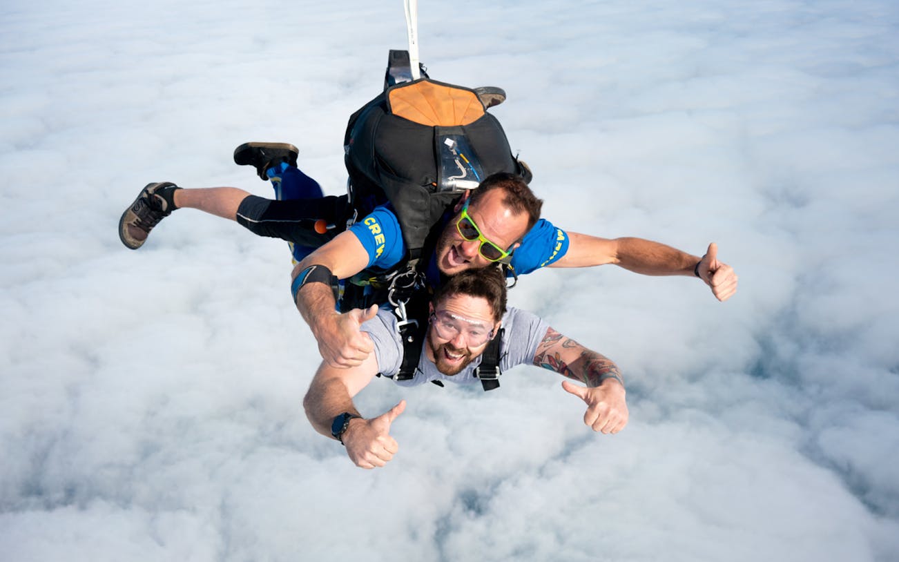 Tandem skydive over clouds in Perth Rockingham, 15,000ft descent.