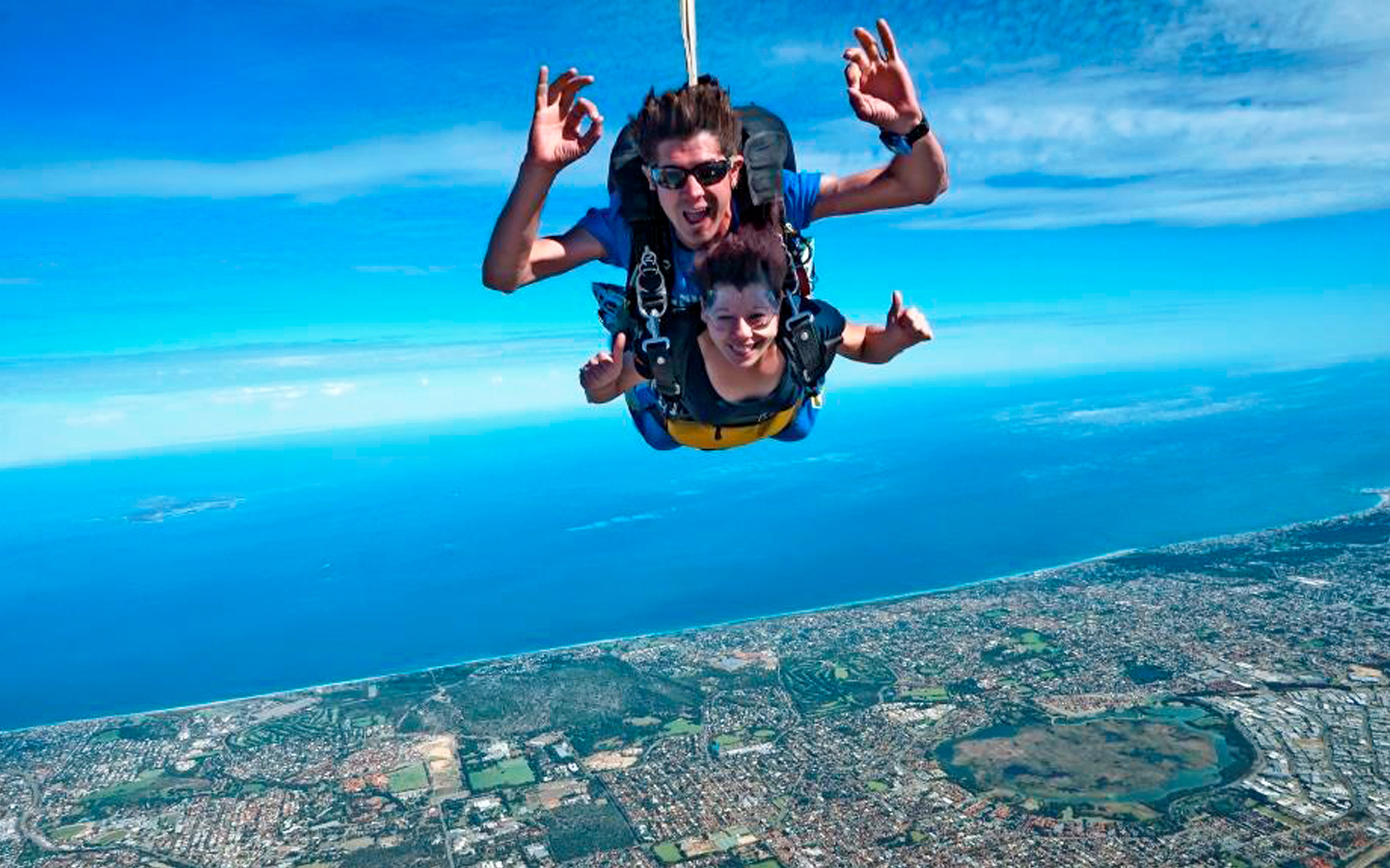 Tandem skydive over Perth city with ocean view at 14,000 feet.