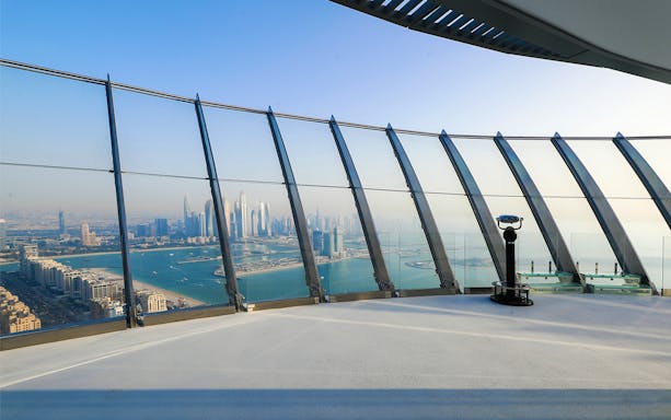 Observation deck view of Dubai skyline and Palm Jumeirah from The View at The Palm.