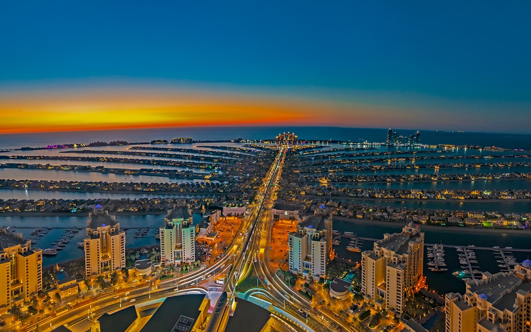 Aerial view of Palm Jumeirah at sunset, Dubai, highlighting The View At The Palm.