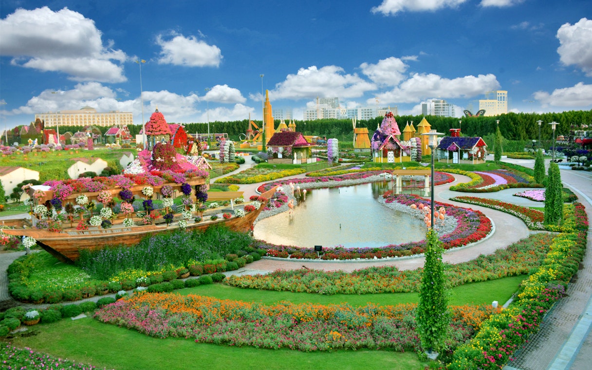 Dubai Miracle Garden with vibrant floral displays and colorful pathways.
