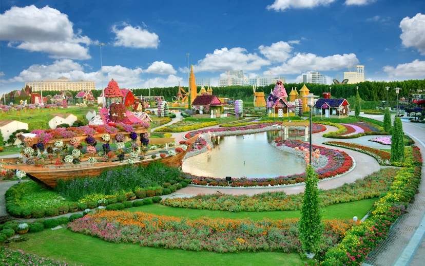 Dubai Miracle Garden with vibrant floral displays and colorful pathways.